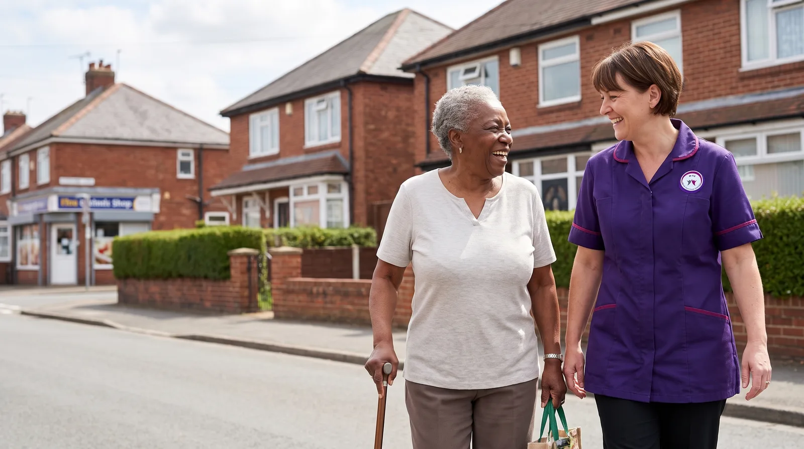 Murray Healthcare carer walking home from the shops with an older woman in Leicester